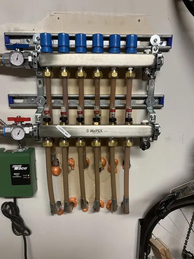 Plumber performing Gas Leak Detection at a residential property in Urbana